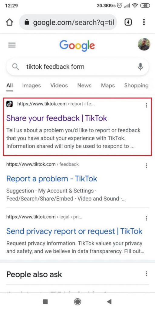 Search for the TikTok feedback form on Google