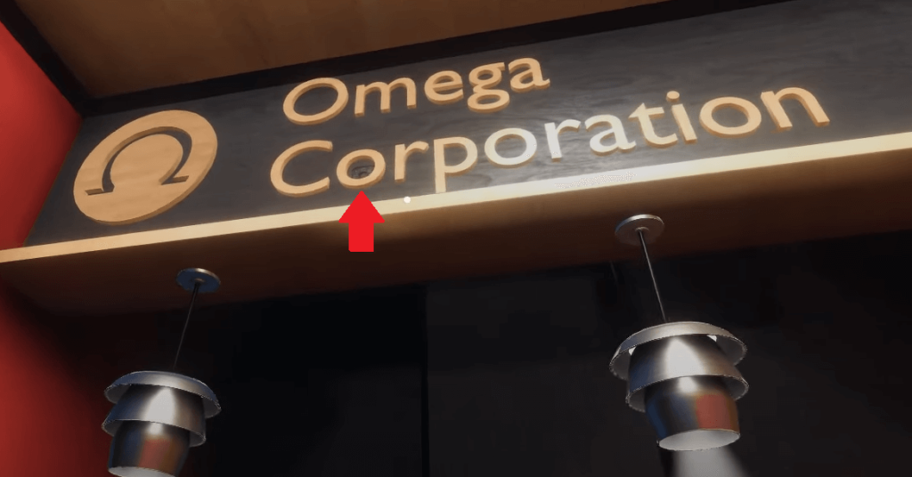 In the first “O” letter of the “Corporation” on the wall above the computer
