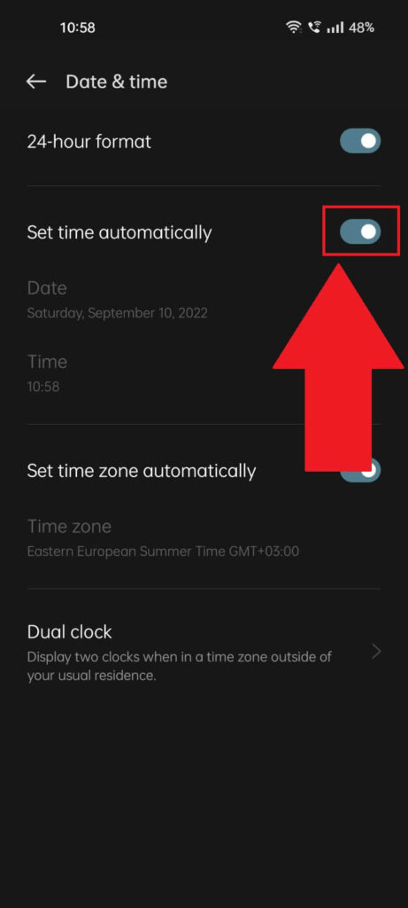 Phone settings page where the "Set time automatically" menu option is highlighted