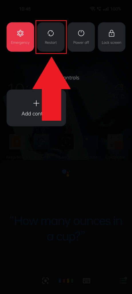 Phone settings page where the "Restart" button is highlighted