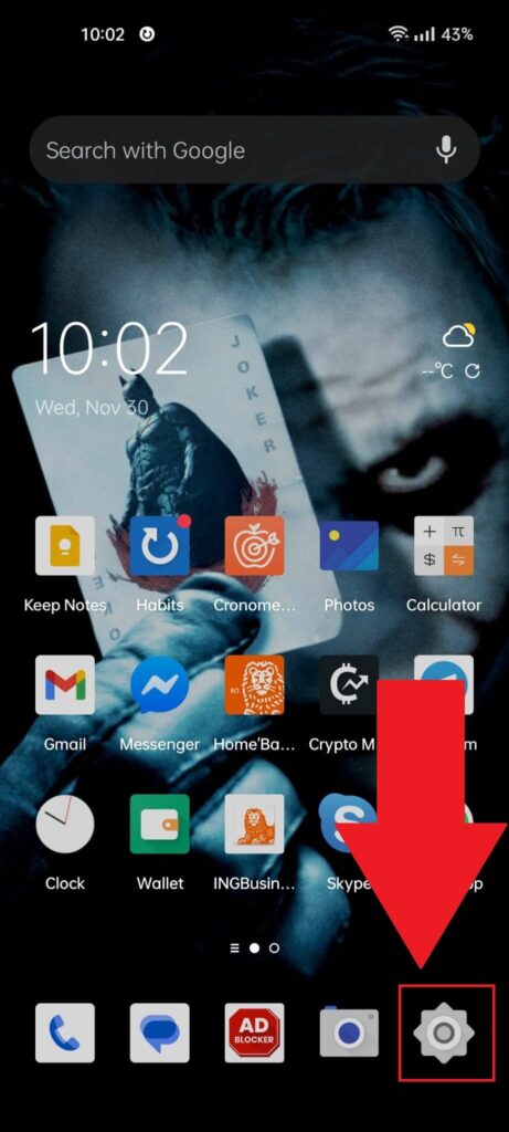 Android background showing the "Settings" icon highlighted in red