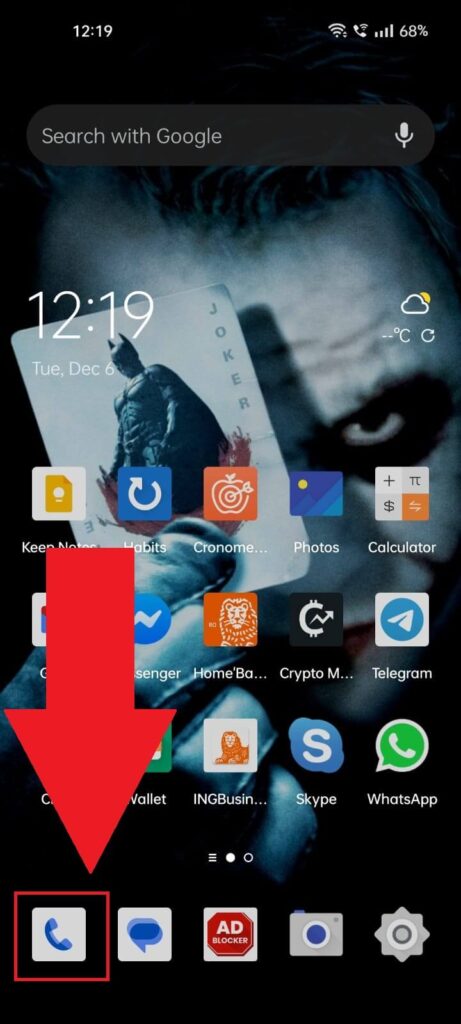 Android phone showing the "Contacts" icon highlighted in the background