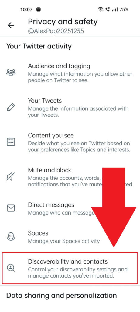 Twitter "Privacy and safety" settings showing the "Discoverability and contacts" option highlighted in red