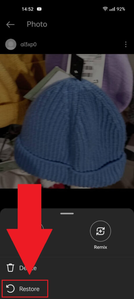 Instagram deleted photo menu showing the "Restore" option highlighted
