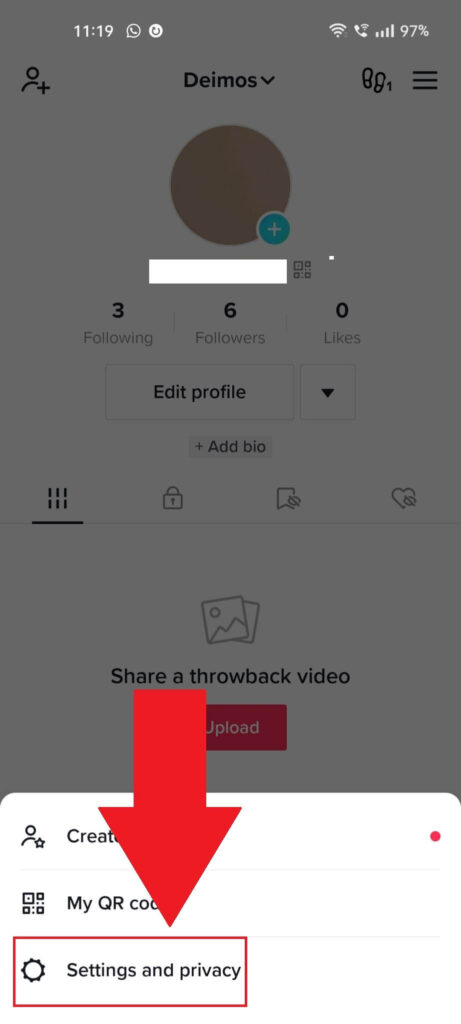 TikTok profile page showing a menu at the bottom of the screen where the "Settings and privacy" option is highlighted