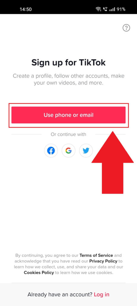 TikTok login screen showing the red "Use phone or email" button highlighted