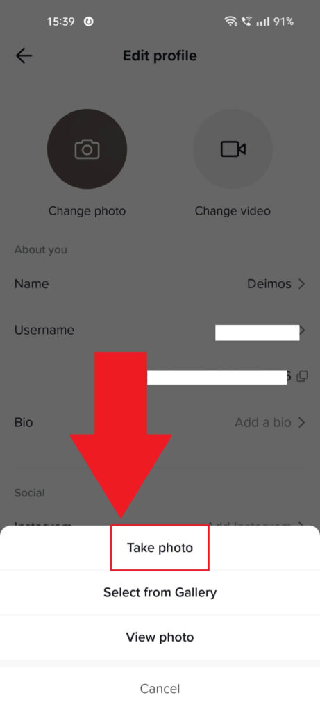 TikTok "Edit profile" page where the "Take photo" button is highlighted at the bottom of the page