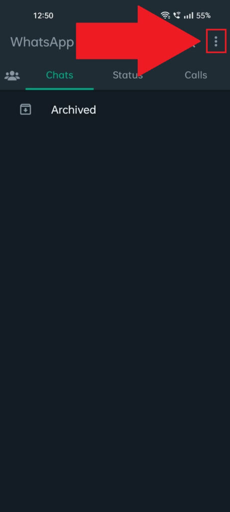 WhatsApp "Chats" page where the three-dot icon is highlighted and has a red arrow pointing to it