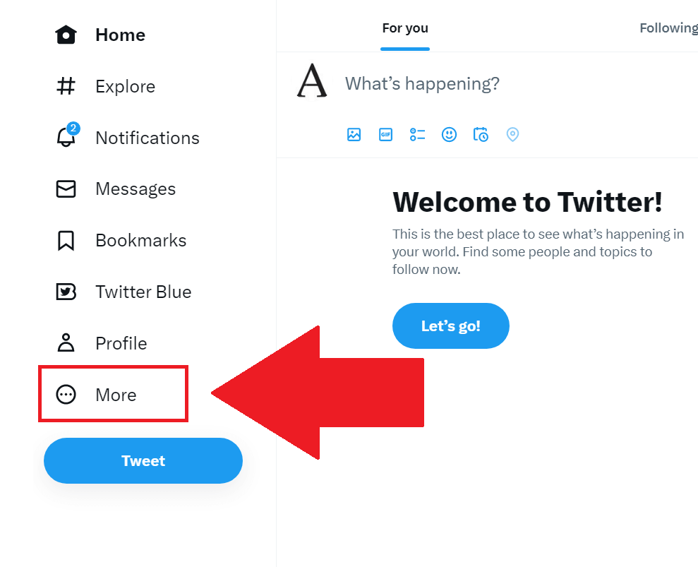 Twitter on desktop showing the "More" option highlighted on the left-hand side and a red arrow pointing to it