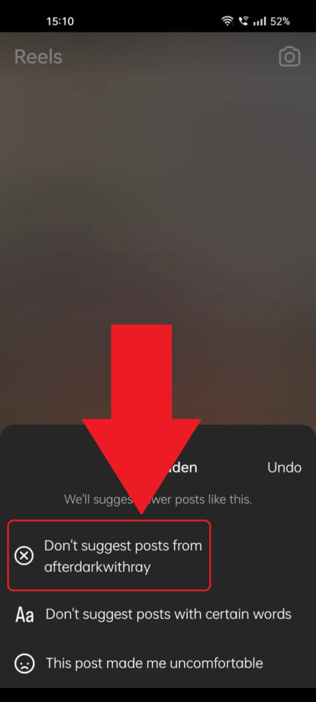 Instagram Reels menu where the "Don't suggest posts from..." option is highlighted and a red arrow is pointing to it 