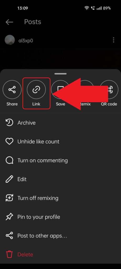 Instagram post menu where the "Link" option is highlighted and has a red arrow pointing to it