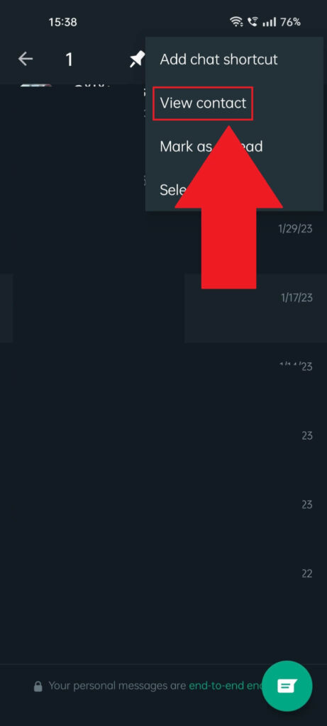  WhatsApp upper-right menu where the "View contact" option is highlighted and there's a red arrow pointing to it