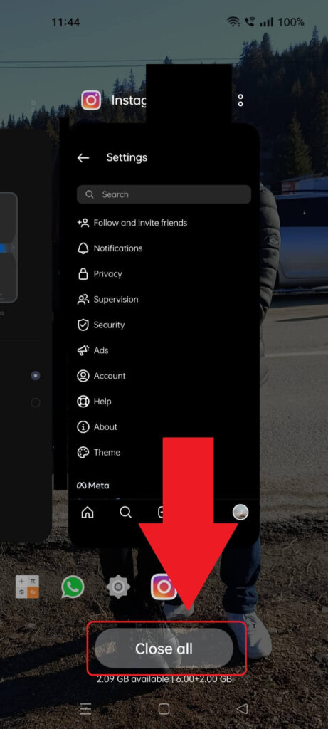 Android phone Overview menu showing the "Close all" option highlighted in red and a red arrow pointing to it