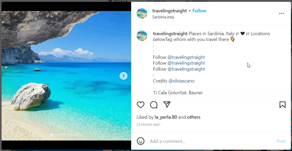 Instagram photo of a beach with light-blue water and rocky mountains in the horizon