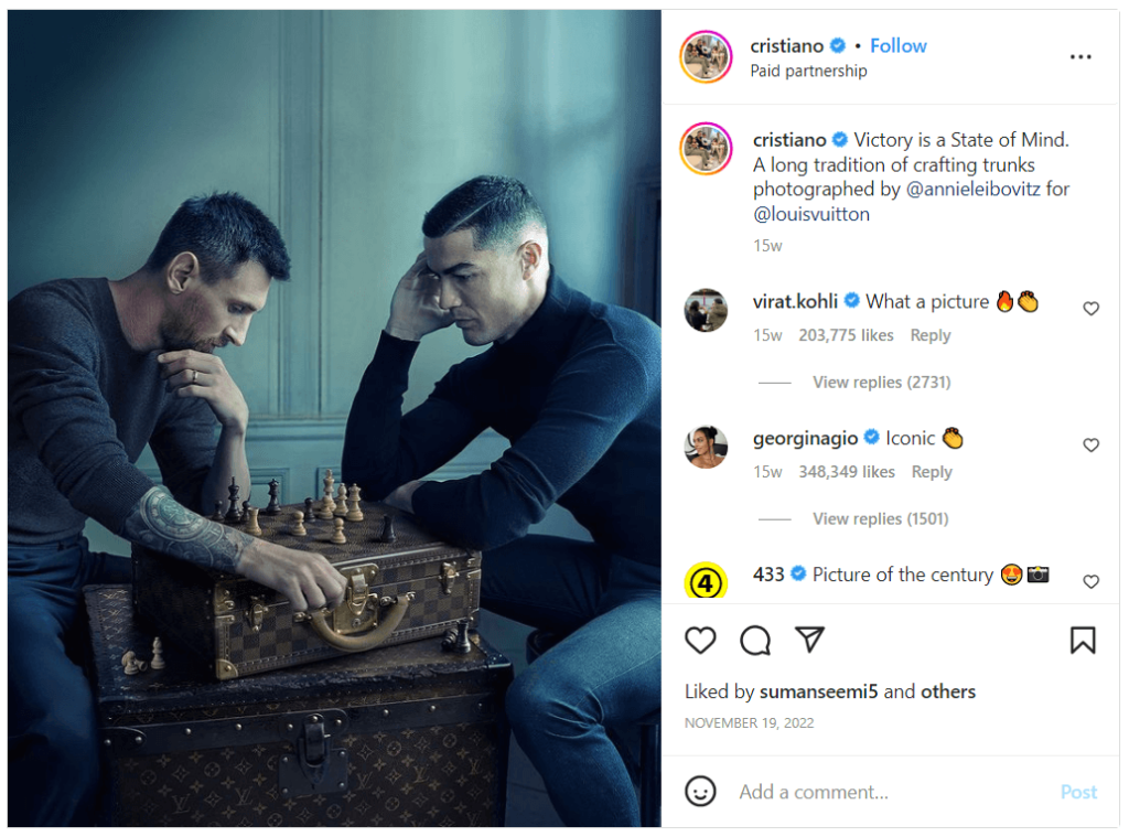 Photo showing Lionel Messing and Cristiano Ronaldo playing chess, posing for Louis Vuitton